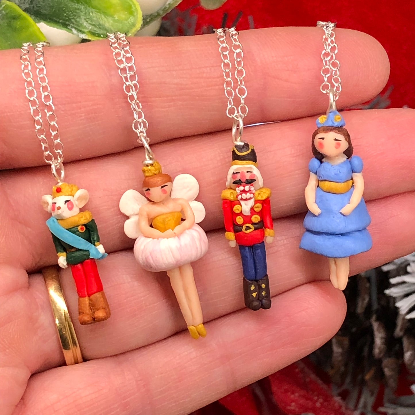 The Nutcracker Clara Nutcracker Necklace hand made from polymer clay from The Nutcracker story our Clara Necklace, a stunning piece of jewelry inspired by the beloved character