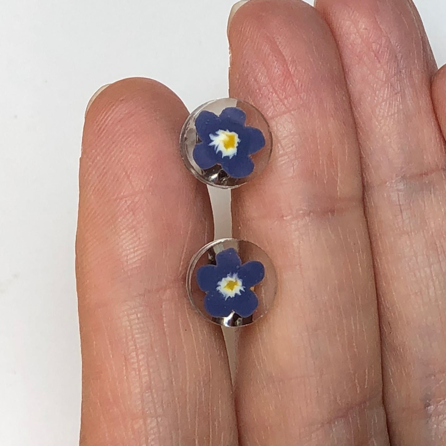 Handmade polymer clay forget me not flowers cast in crystal clear resiMiniature handmade polymer clay Forget-me-not flowers cast in crystal clear epoxy resin make for stunning stud earrings. These delicate creations are meticulously crStud earringsPadpodandberrieMy Fairytale Giftscrystal clear resin stud earrings