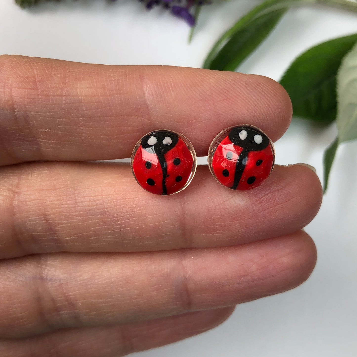 Miniature Handmade polymer clay ladybirds in crystal clear resin stud ✨🐞 Add a whimsical touch to your everyday style with our Miniature Handmade Polymer Clay Ladybird Earrings, beautifully cast in crystal clear epoxy resin. These vibLadybird Stud earringsPadpod & BerrieMy Fairytale GiftsMiniature Handmade polymer clay ladybirds